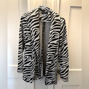 This was for a theme party and now reselling.Really cute with black turtle neck